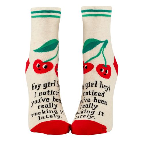 Blue Q ankle socks featuring the message "Hey Girl Hey! I Noticed You’ve Been Really Rocking It Lately," designed to spread positivity and celebrate hard work.