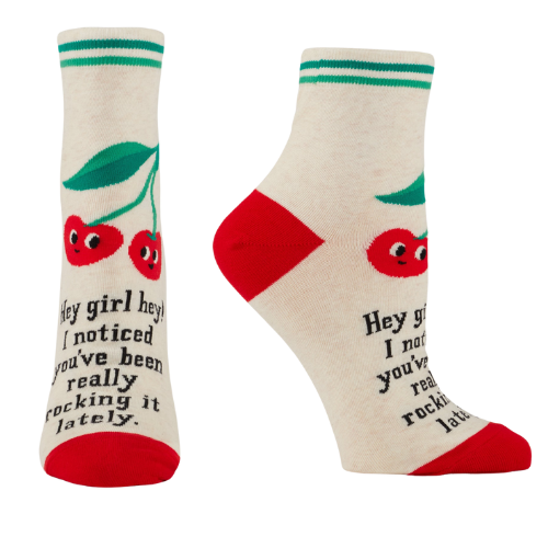 Blue Q ankle socks featuring the message "Hey Girl Hey! I Noticed You’ve Been Really Rocking It Lately," designed to spread positivity and celebrate hard work.